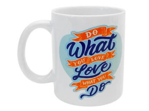 White ceramic mug with colorful custom text design, ideal for branding or motivational gifts.