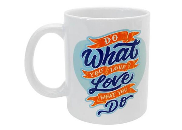 White ceramic mug with colorful custom text design, ideal for branding or motivational gifts.