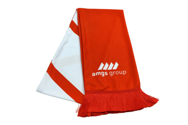 Dual-colour promotional scarf from AMGS Group with a bold logo and dense tassels, shown folded.