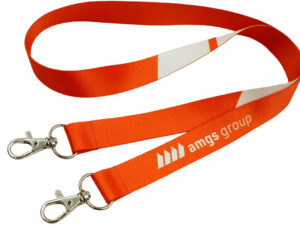 Red polyester lanyard with two hooks and sublimation print. A professional promotional item for brand visibility, available at AMGS Group.