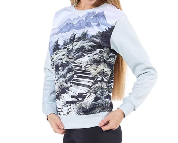 Custom printed women's thermal sweatshirt. Side view, with a sublimated mountain print. From AMGS Group.
