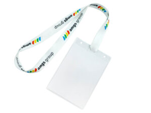A pre-assembly view showing a white polyester lanyard with attachment slits next to a clear plastic ID holder.