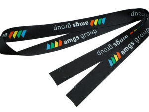 A personalized black r-PET lanyard with a repeating logo, arranged to display both ends with their hookless attachment slits.