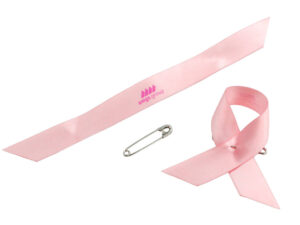 Pink satin awareness ribbon pin with safety pin and logo print, manufacturer AMGS Group.