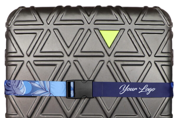 Personalized luggage strap with corporate logo secured around a grey textured suitcase, aiding easy baggage identification.