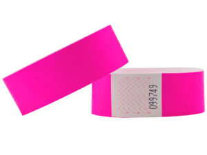 Neon pink Tyvek wristband, 25mm. Wide band perfect for concerts and festivals. Manufacturer AMGS Group.
